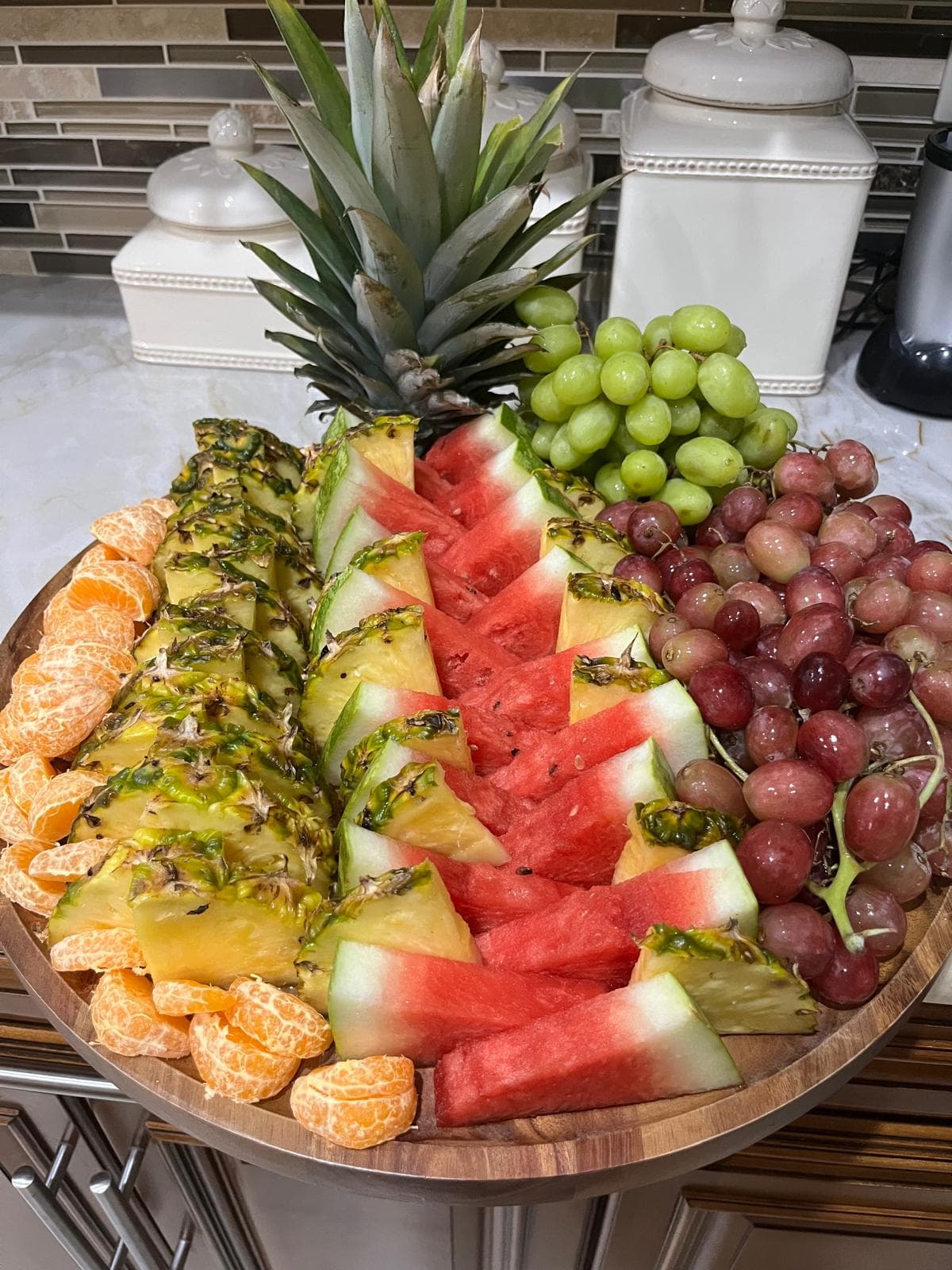 Fresh fruit platter with pineapple, watermelon, mandarin oranges and grapes catered by Angela's Kitchen